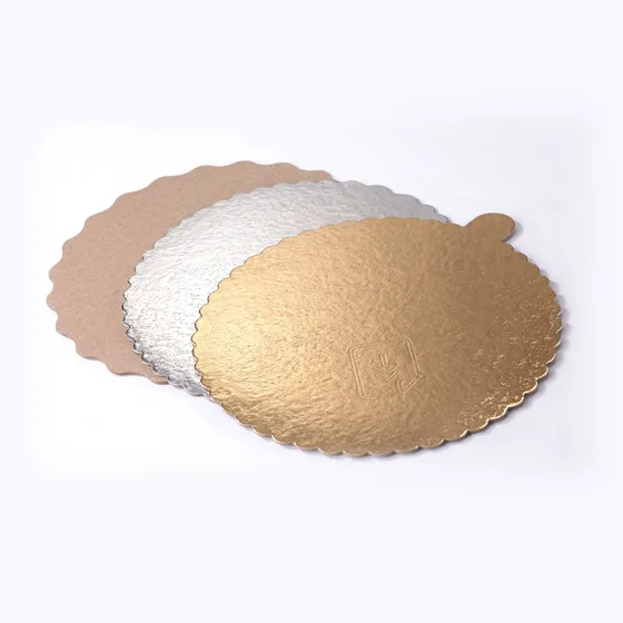 Gold, silver, and kraft flower-cut boards with scalloped edges